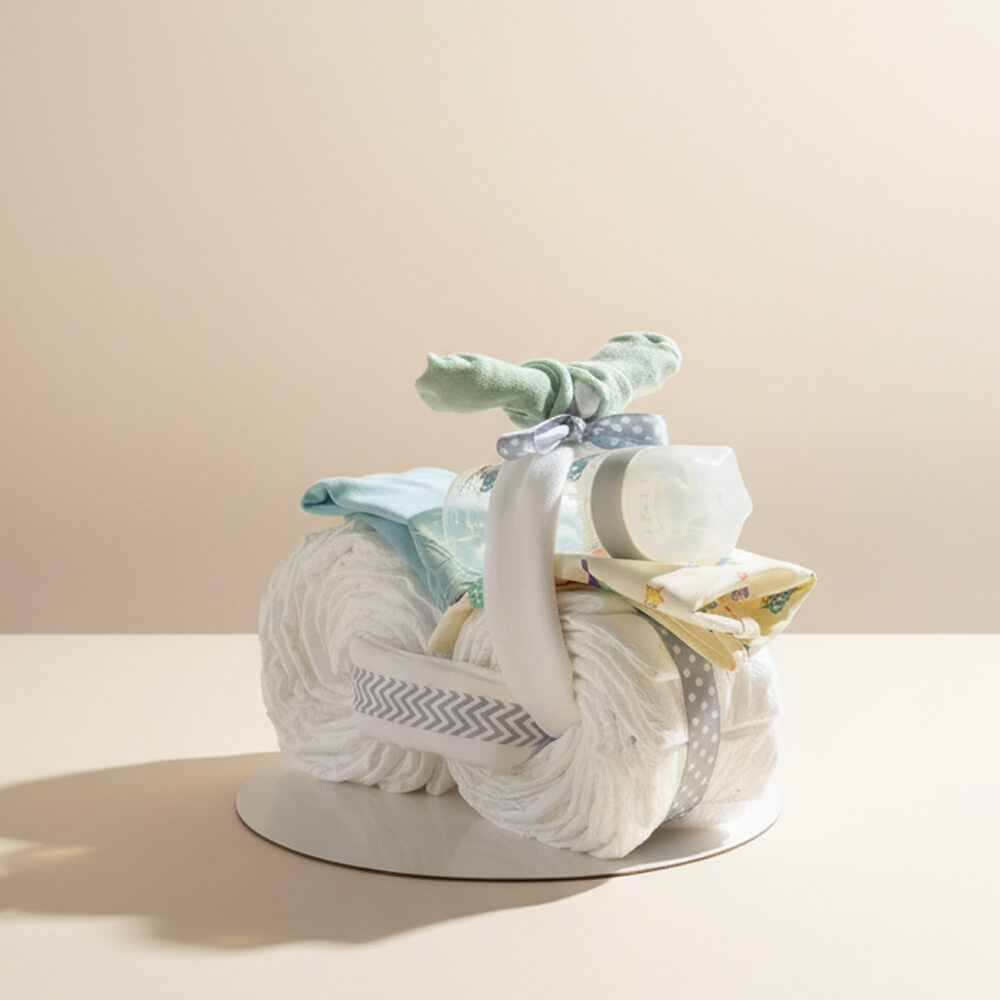 Blå blemotorcykel med søde detaljer som kreativ babyshowergave til dreng