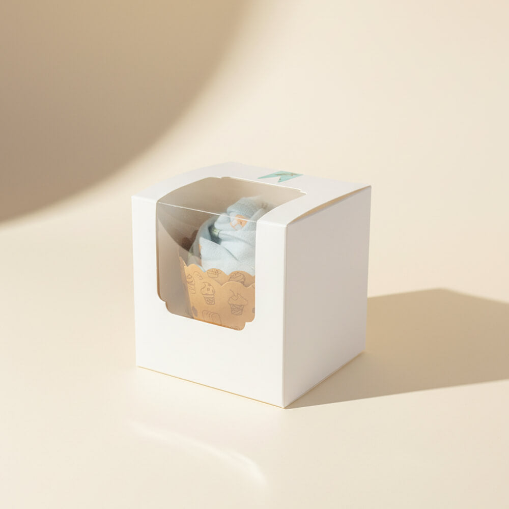 Cupcake lavet af babybody i blå farver som sød gave til babyshower for dreng