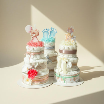 Store blekager i blå, lyserød og neutral farve som håndlavede babyshowergaver