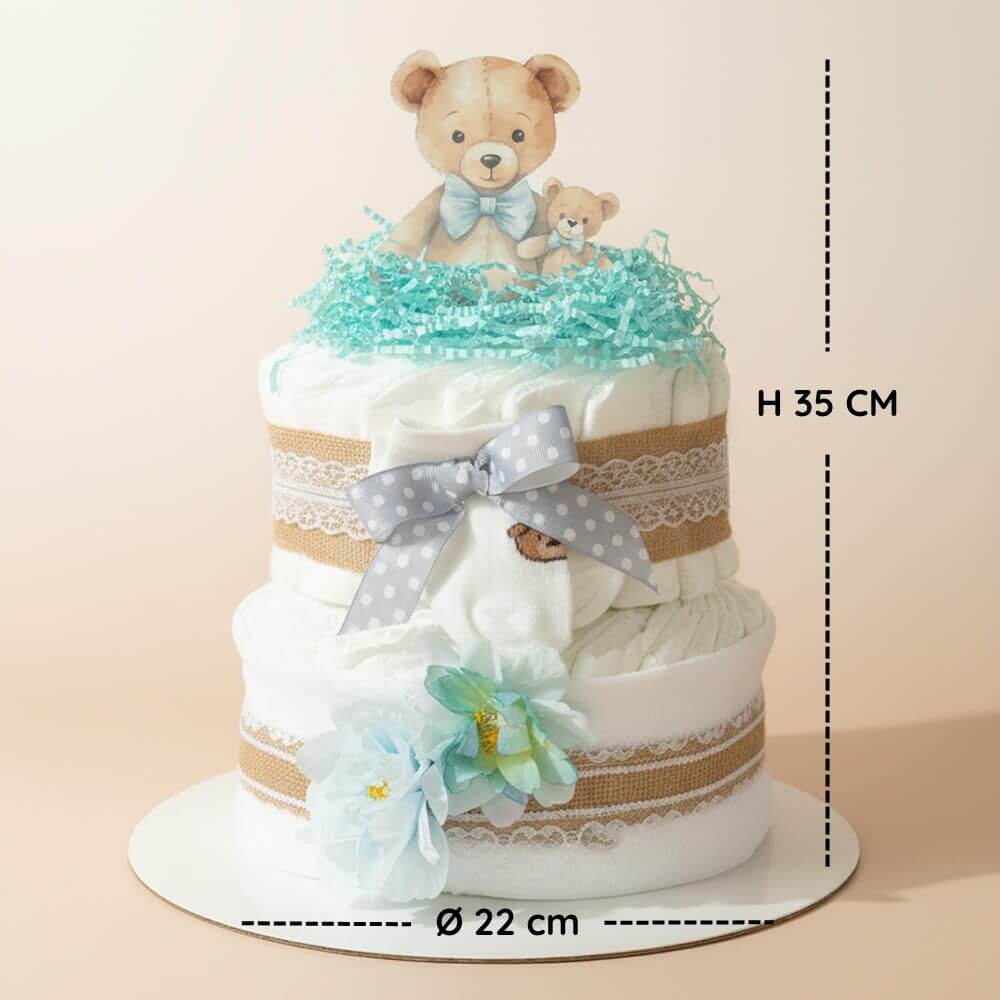 Mellem blekage til drengebaby med blå bånd og pynt