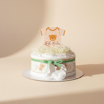 Lille neutral blekage i lyse farver med søde detaljer som babyshowergave