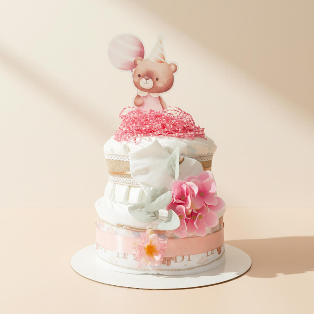 Mellem blekage i lyserøde nuancer med blomster og pynt som gave til pige