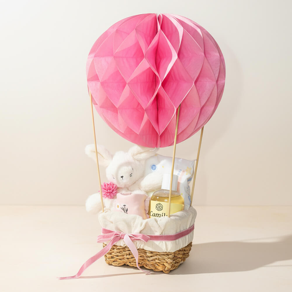Luftballon gavekurv i lyserød farve pyntet med bamse som gave til pige