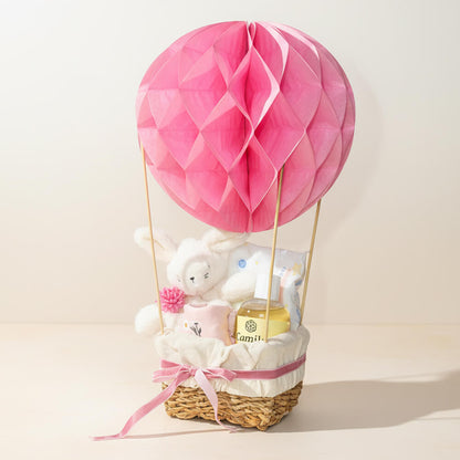 Luftballon gavekurv i lyserød farve pyntet med bamse som gave til pige